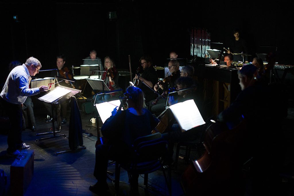 Photo showing the orchestra performing at the 10th anniversary performance of The Last Train by Carl Davis, performed at the Minerva Theatre, Chichester in January 2025. Photo credit - Dan Stevens